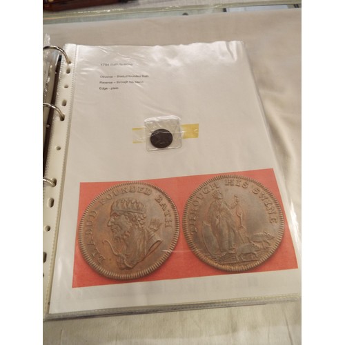 168 - An album containing tokens, half penny tokens from 1700's to 1800 all with paperwork to include Port... 