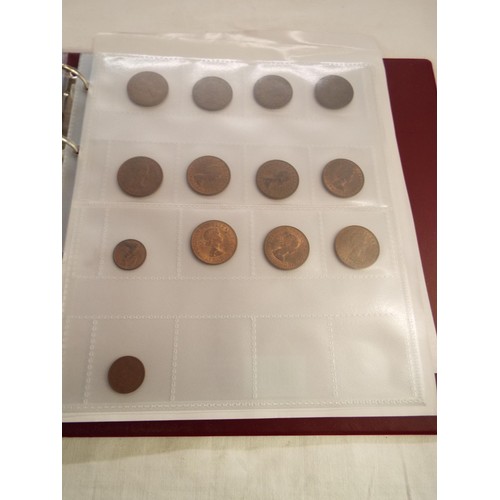 174 - An album of copper half penny coins