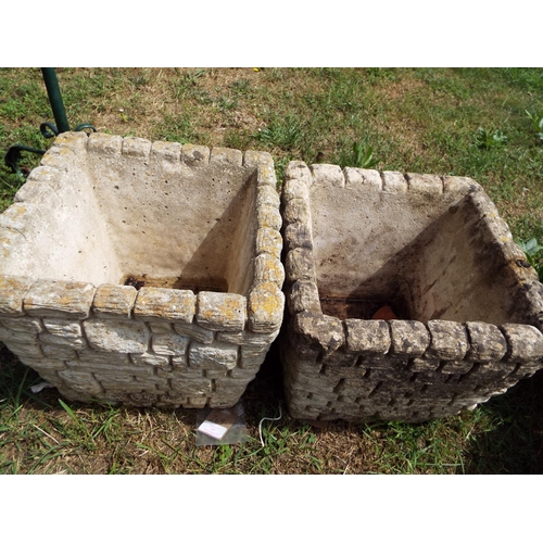 269 - A pair of concrete garden planters