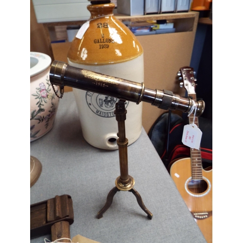 283 - A reproduction telescope on tri-pod stand inscribed W. Ottway & Co Ltd London