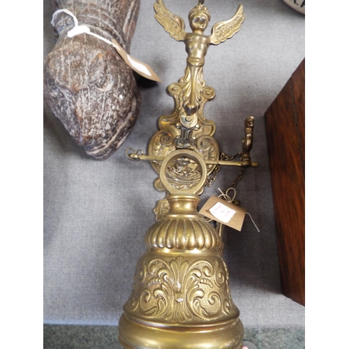 293 - A vintage decorative wall hanging brass bell