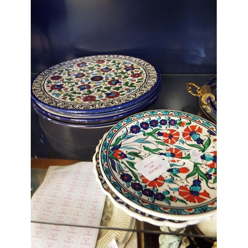 128 - A selection of assorted Iznik patterned plates