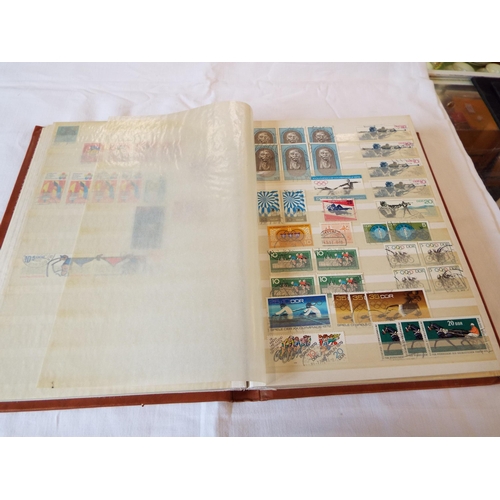 73 - An album housing a quantity of German used stamps