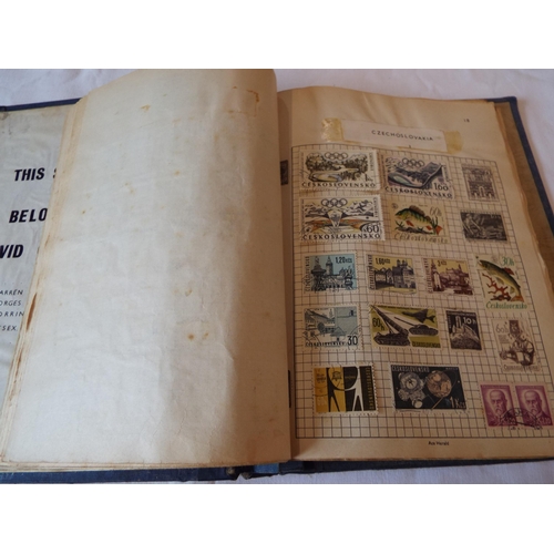 74 - An Ace Herald stamp album housing a mixed selection of stamps to include Australia, Belgium, Canada,... 