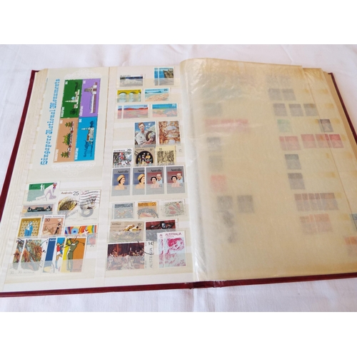 75 - An album housing a selection of used and mint stamps to include Viet-Nam, Cong-Hoa, Jamaica, India, ... 