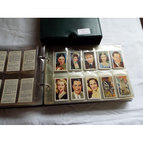 87 - An album housing approx thirteen sets of Gallaher Ltd cigarette cards to include 'Dogs', 'My Favouri... 