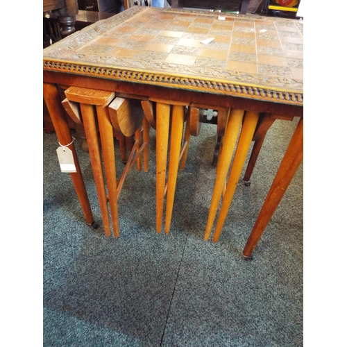 599 - A vintage nest of four tables