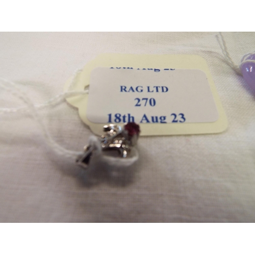 270 - A 925 silver pendant inset with ruby