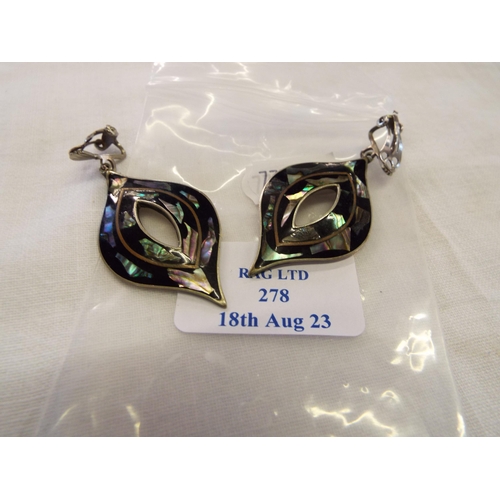 278 - A pair of silver earrings inset with abalone shell