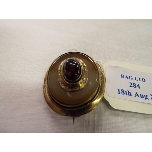 284 - A Georgian gold brooch inset with black opal and agate