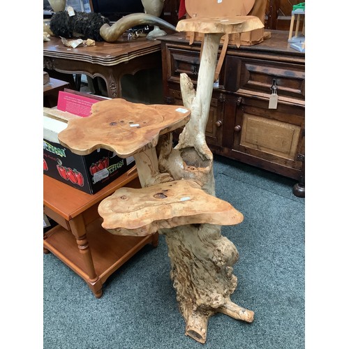 659 - A vintage ornate tree trunk display stand