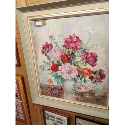502 - A large mounted and framed oil on canvas still life of a vase of flowers signed lower right