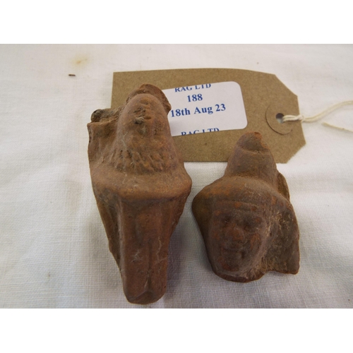 An Ancient Egyptian pale terracotta figural head wearing a long wig 304 ...