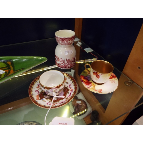 15 - A Royal Worcester coffee cup and saucer A/F, a Dresden coffee cup and saucer A/F and a china double ... 