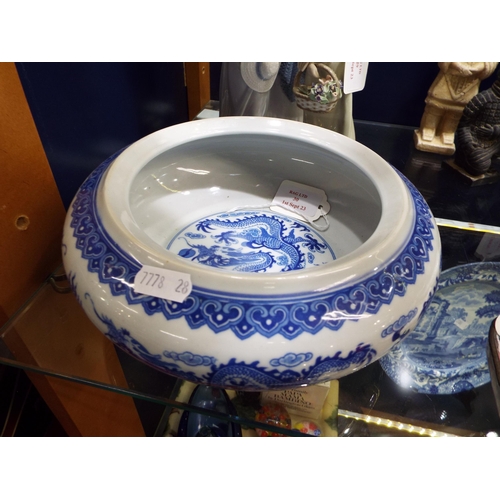 30 - A Chinese blue and white bowl having dragon chasing the pearl of wisdom decoration