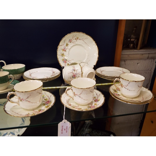 39 - A vintage tea-set comprising of six cups, saucers, sandwich plate and cake plate having floral and g... 