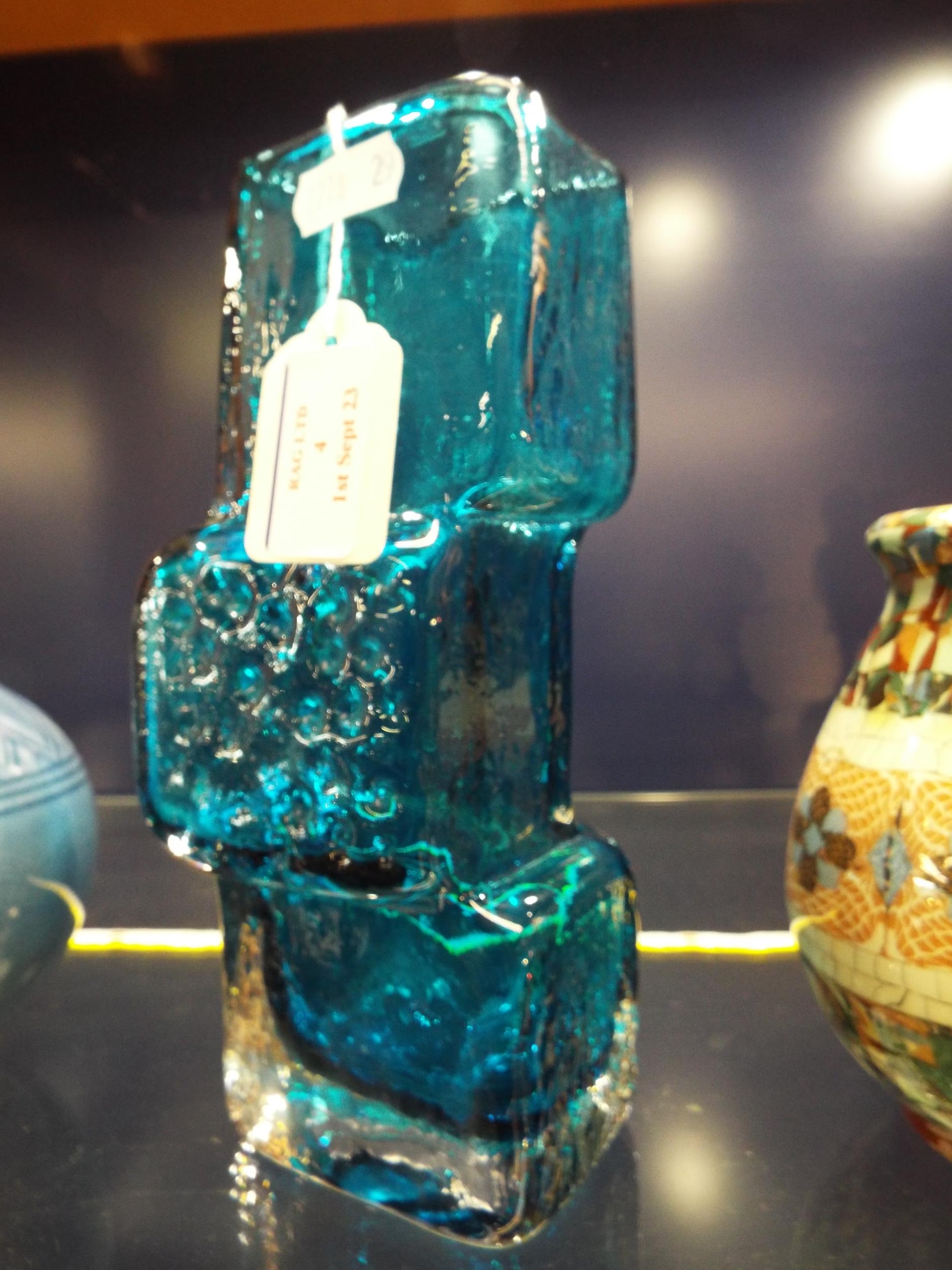 A c 1960's Whitefriars blue ground drunken brick layer vase