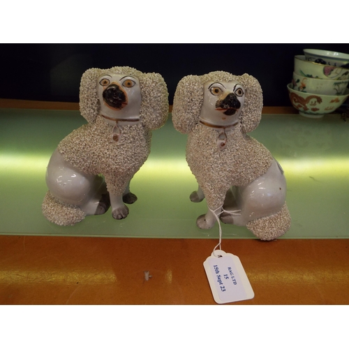 15 - A pair of vintage Staffordshire 'King Charles Spaniels'