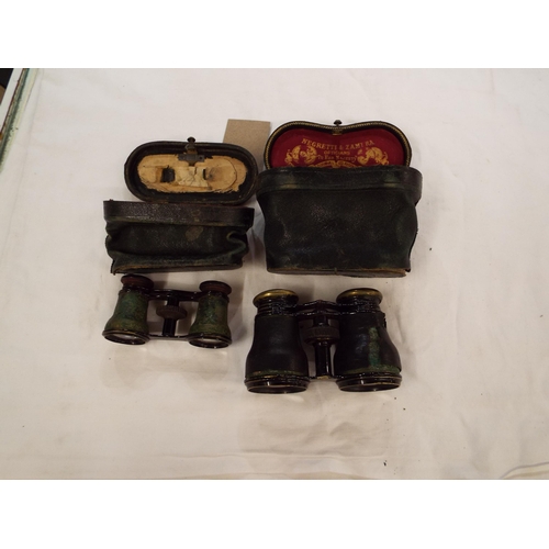 150 - Two pairs of vintage opera glasses