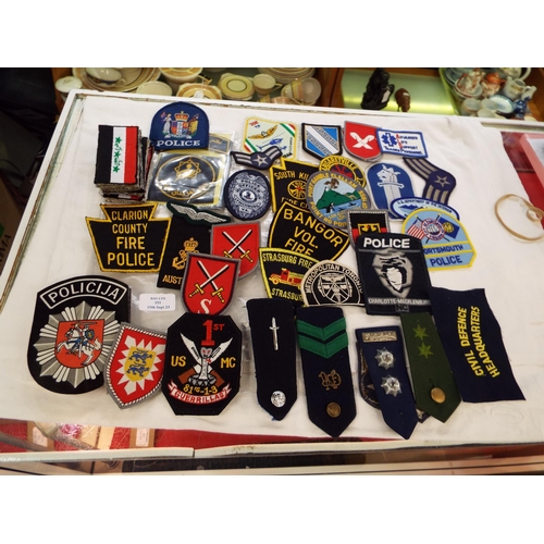 151 - A mixed selection of cloth insignia mainly USA