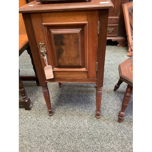 551 - A mahogany bedside cabinet