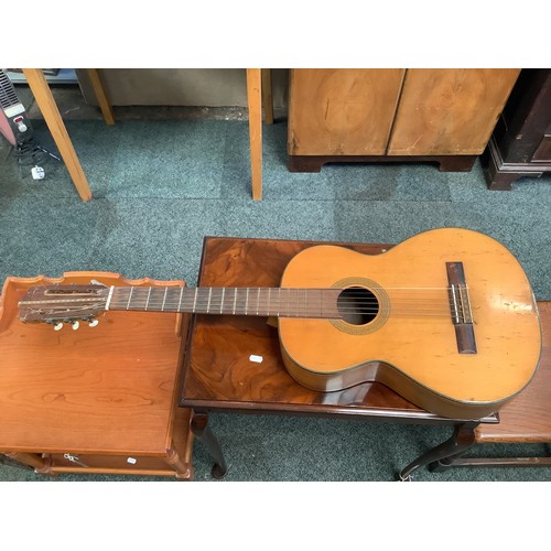 548 - A vintage guitar