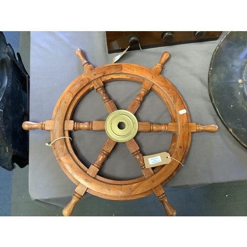 536 - A cabin cruiser six spoke wooden and brass wheel