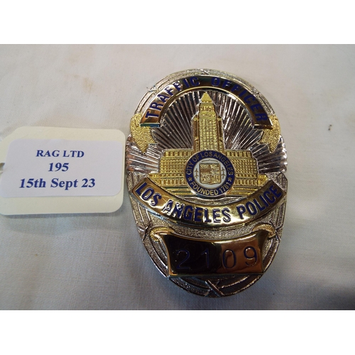 195 - A Los Angeles Police traffic officer badge No 2100