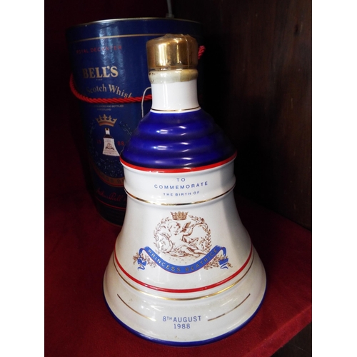 250 - A unopened Bells Whisky decanter commemorating the birth of Princess Beatrice 1988 housed in a tin