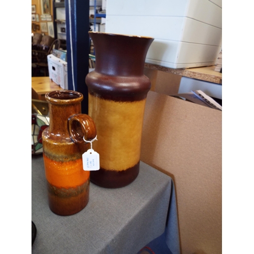 261 - A large West German lava vase together with another