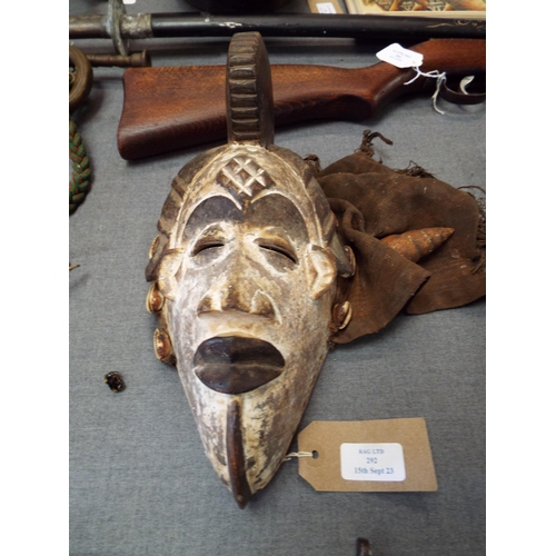 292 - A late 19th early 20thC ceremonial facemask from the Gabon a French Colony which is made of wood and... 