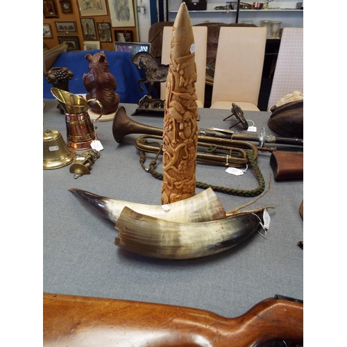 294 - A pair of horns and a resin animal decorated tusk