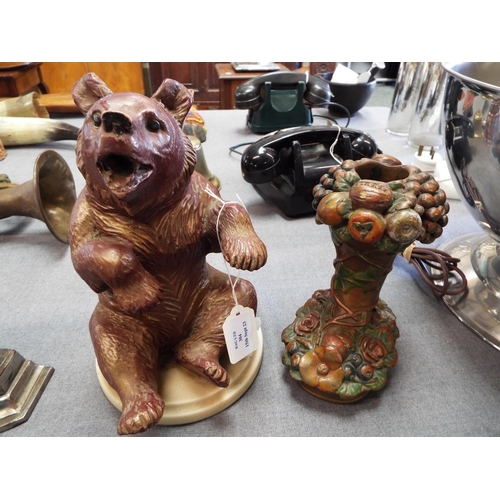 304 - A heavy figure of a brown bear mounted on an alabaster base and a horn of plenty lamp base