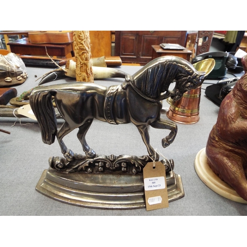 305 - A polished iron Victorian doorstop of a horse