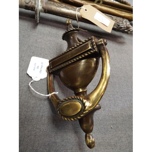 306 - A Victorian brass door knocker