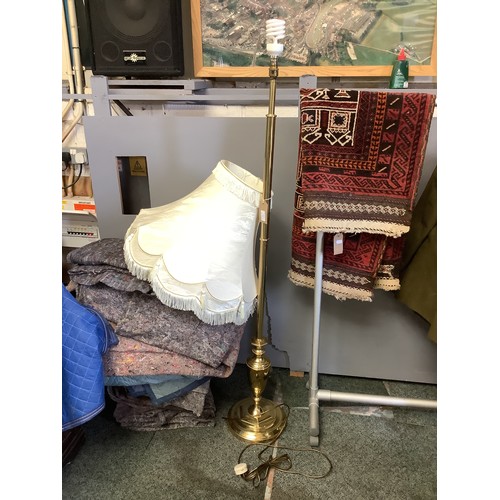 326 - A brass lamp stand and cream shade