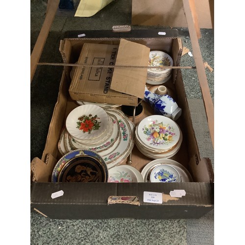 339 - A mixed selection of assorted china to include plates, cake plates, vases etc