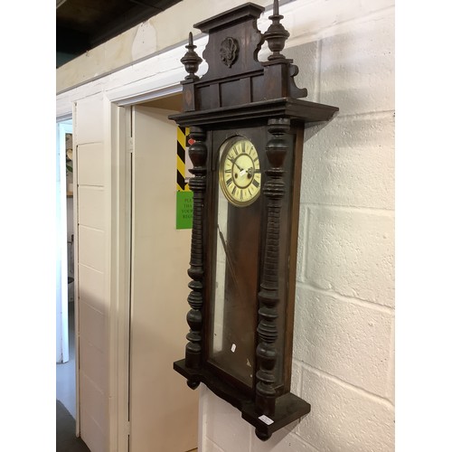 341 - A vintage oak case wall clock