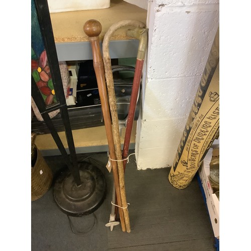 363 - A selection of walking/shooting sticks