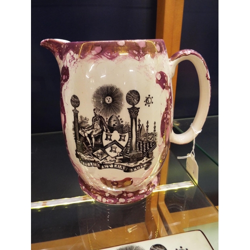 29 - A large Sunderland lustre-ware pink milk jug for the Masonic Lodge with pictorial panel and verse 7 ... 