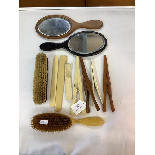 178 - A mixed selection to include brushes, mirrors, glove stretchers etc