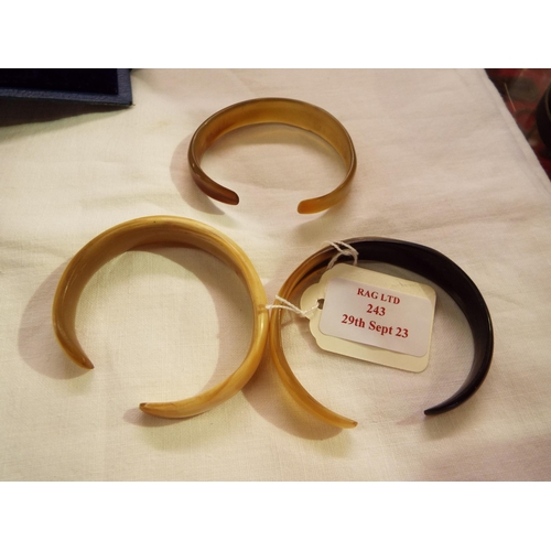 243 - Three vintage horn bangles