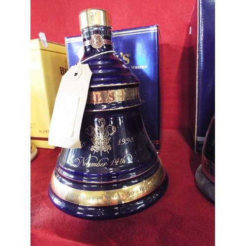 285 - A unopened boxed limited edition Bells Whisky decanter commemorating 50th birthday of the Prince of ... 