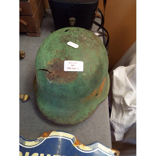 305 - A WWII German Military helmet