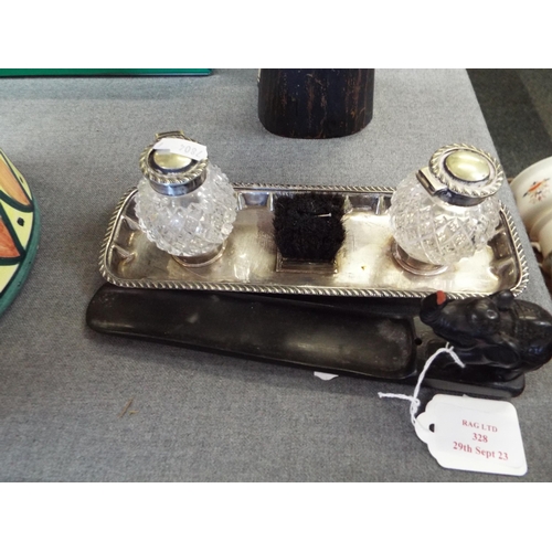 328 - A silver-plated inkwell stand with central nib brush and an ebony shoe horn with elephant decoration