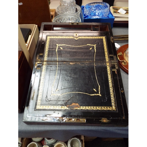 341 - A Victorian brass bound walnut writing box with a fitted drawer