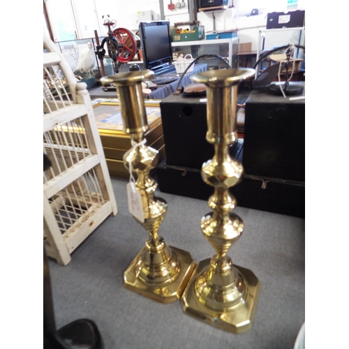 361 - A pair of brass candlesticks