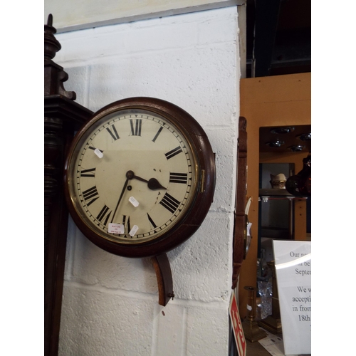 395 - A Victorian mahogany cased wall clock with fussee movement the dial having Roman numerals