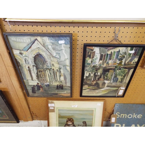 476 - Two framed watercolours depicting a cathedral scene and a courtyard scene