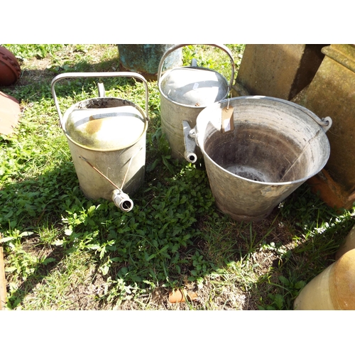 515 - Two galvanised watering cans and bucket